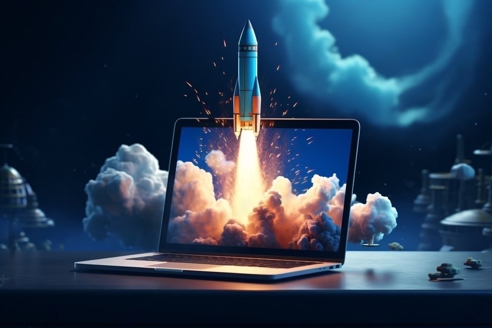Un razzo decolla dallo schermo di un computer portatile.